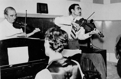 Abu'l-Hasan Sabā, 'Ali Tajvidi, Mortazā Mahjubi at Maydān-i Arg Radio Studio Tehran, circa 1955.